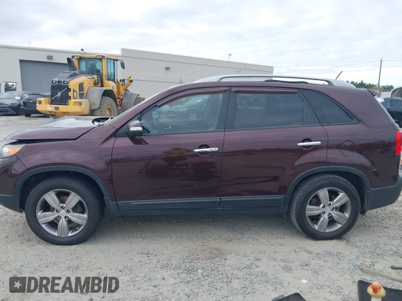 2013 Kia Sorento EX with VIN 5XYKU4A21DG312753, listed as a IAAI auction lot 41033124 with 197,459 mi miles and . Bid and sale history available at carsss.com. Image 14.
