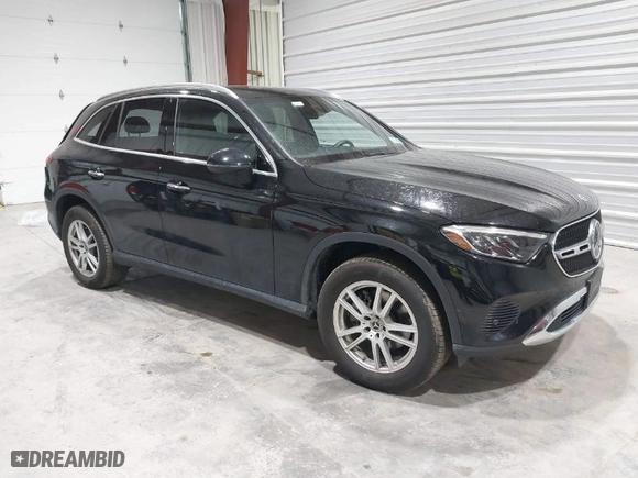 2023 Mercedes-Benz GLC with VIN W1NKM4HB1PU020439, listed as a IAAI auction lot 41676723 with 25,609 mi miles. Bid and sale history available at carsss.com. Image 1.