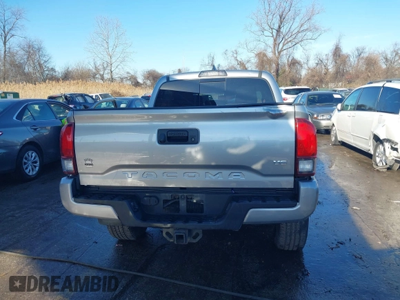 2018 Toyota Tacoma SR with VIN 5TFCZ5AN3JX151479, listed as a IAAI auction lot 41428376 with 104,717 mi miles. Bid and sale history available at carsss.com. Image 16.