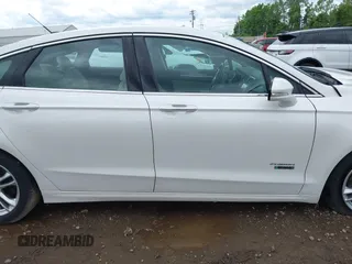 2016 Ford Fusion Titanium with VIN 3FA6P0SU5GR287017, listed as a IAAI auction lot 42316622 with 97,000 mi miles and . Bid and sale history available at DreamBid. Image 13.