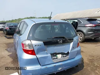 2009 Honda Fit with VIN JHMGE88209S052443, listed as a IAAI auction lot 42406572 with 140,343 mi miles and . Bid and sale history available at DreamBid. Image 6.