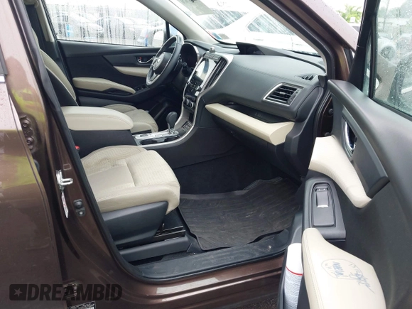 2019 Subaru Ascent Premium with VIN 4S4WMAFD9K3413983, listed as a IAAI auction lot 42257670 with 64,087 mi miles and . Bid and sale history available at DreamBid. Image 5.