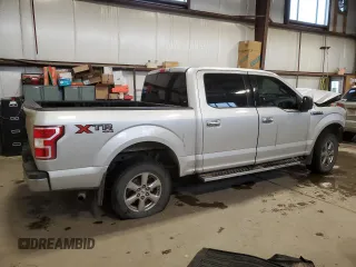 2019 Ford F-150 XL with VIN 1FTEW1EB4KKE25698, listed as a Copart auction lot 86572094 with 211,190 mi miles and Salvage Title. Bid and sale history available at carsss.com. Image 3.