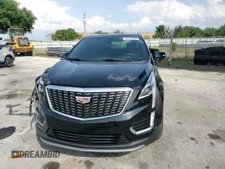 2022 Cadillac XT5 FWD Premium Luxury z VIN 1GYKNCRS7NZ101131, wystawiony jako Copart lot #56365065 z przebiegiem 74 168 mil mil oraz Szkoda całkowita • Salvage title. Historia ofert i sprzedaży dostępna na DreamBid. Obrazek 14.