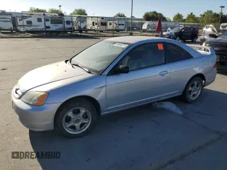 2003 Honda Civic LX with VIN 1HGEM225X3L036961, listed as a Copart auction lot 58660274 with 0 mi miles and Salvage Title. Bid and sale history available at carsss.com. Image 1.