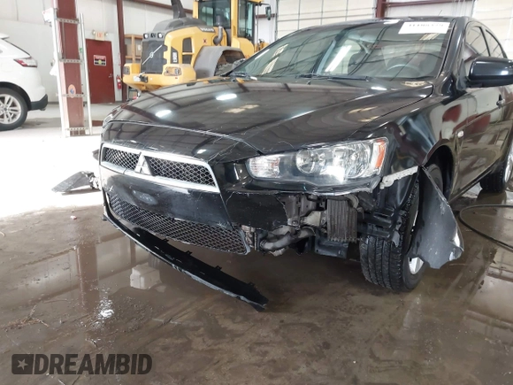 2008 Mitsubishi Lancer DE with VIN JA3AU26UX8U015865, listed as a IAAI auction lot 41108329 with 131,884 mi miles. Bid and sale history available at carsss.com. Image 6.