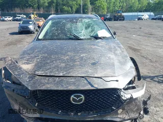 2023 Mazda CX-30 S Carbon Edition with VIN 3MVDMBCM6PM510231, listed as a IAAI auction lot 42579591 with 29,240 mi miles and . Bid and sale history available at DreamBid. Image 12.