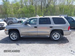 2001 Dodge Durango z VIN 1B4HS28Z71F586249, wystawiony jako IAAI lot #42102007 z przebiegiem 211 850 mil mil oraz . Historia ofert i sprzedaży dostępna na DreamBid. Obrazek 14.