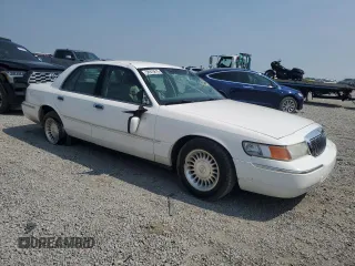 2002 Mercury Grand Marquis LS Premium z VIN 2MEFM75W52X666147, wystawiony jako Copart lot #58970815 z przebiegiem 133 495 mil mil oraz Szkoda całkowita • Salvage title. Historia ofert i sprzedaży dostępna na DreamBid. Obrazek 4.
