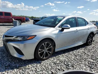 2018 Toyota Camry LE с VIN 4T1B11HK4JU053856, выставлен на аукционе Copart как лот 61017095 с пробегом 134 977 миль миль и Списание • Salvage title. История ставок и продаж доступна на DreamBid. Изображение 1.