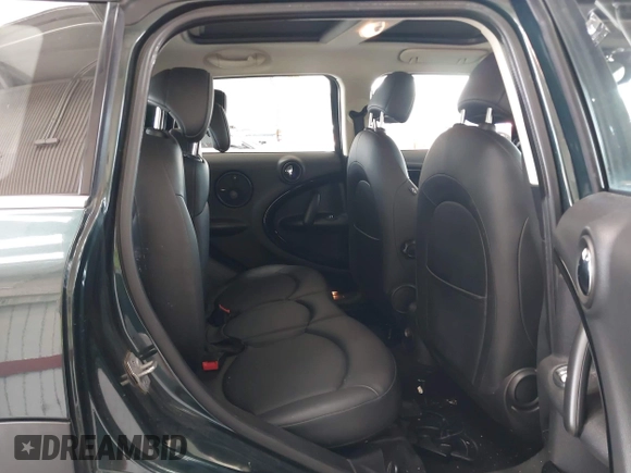 2013 MINI Countryman S with VIN WMWZC3C56DWP24170, listed as a IAAI auction lot 42366594 with 143,311 mi miles and . Bid and sale history available at DreamBid. Image 8.
