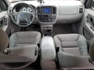 2002 Ford Escape XLT Choice with VIN 1FMCU04132KB16848, listed as a Copart auction lot 55266595 with 205,451 mi miles and Salvage title. Bid and sale history available at DreamBid. Image 8.