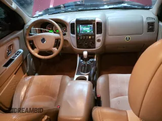 2005 Mercury Mariner Luxury z VIN 4M2YU57115DJ31385, wystawiony jako Copart lot #82533724 z przebiegiem 184 825 mil mil oraz Tytuł czysty. Historia ofert i sprzedaży dostępna na DreamBid. Obrazek 8.