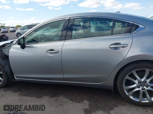2014 Mazda 6 i Grand Touring с VIN JM1GJ1W57E1104801, выставлен на аукционе IAAI как лот 42060144 с пробегом 95 212 миль миль и . История ставок и продаж доступна на DreamBid. Изображение 15.