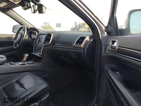 2016 Jeep Grand Cherokee Limited 75th Anniversary with VIN 1C4RJFBG5GC401277, listed as a IAAI auction lot 41119644 with 156,658 mi miles and . Bid and sale history available at DreamBid. Image 5.