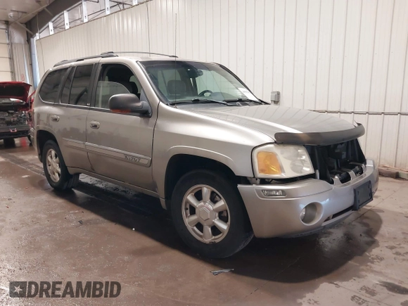 2003 GMC Envoy SLE z VIN 1GKDT13S432299338, wystawiony jako IAAI lot #41443555 z przebiegiem 161 918 mil mil oraz . Historia ofert i sprzedaży dostępna na DreamBid. Obrazek 1.