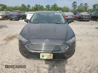 2017 Ford Fusion SE z VIN 3FA6P0H73HR294017, wystawiony jako Copart lot #50665935 z przebiegiem 62 426 mil mil oraz Czysty tytuł • Clean title. Historia ofert i sprzedaży dostępna na DreamBid. Obrazek 5.