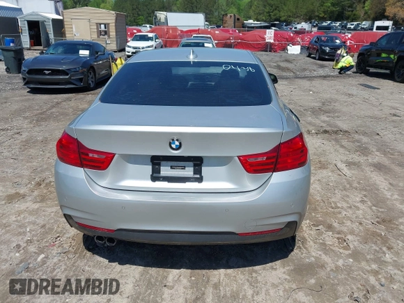 2014 BMW 4 Series 428i with VIN WBA3N7C50EK220438, listed as a IAAI auction lot 41990873 with 141,736 mi miles and . Bid and sale history available at carsss.com. Image 16.