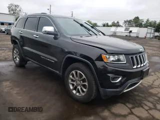 2014 Jeep Grand Cherokee Limited z VIN 1C4RJFBG7EC546642, wystawiony jako Copart lot #61445615 z przebiegiem 128 921 mil mil oraz Szkoda całkowita • Salvage title. Historia ofert i sprzedaży dostępna na DreamBid. Obrazek 4.