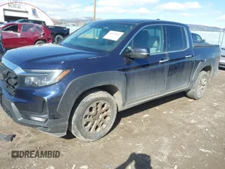 2022 Honda Ridgeline RTL-E with VIN 5FPYK3F71NB013522, listed as a IAAI auction lot 41670347 with 24,689 mi miles and . Bid and sale history available at DreamBid. Image 17.