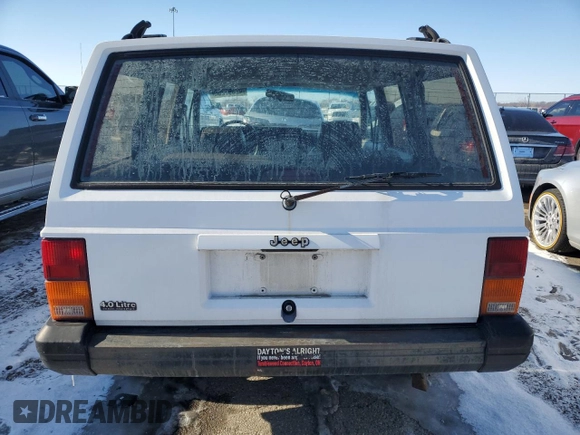 1994 Jeep Cherokee Sport with VIN 1J4FJ68S5RL135545, listed as a Copart auction lot 42397255 with 199,054 mi miles and Salvage Title. Bid and sale history available at carsss.com. Image 6.