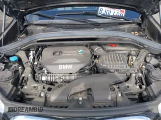2019 BMW X1 sDrive28i with VIN WBXHU7C59K5L12320, listed as a IAAI auction lot 42116860 with 28,183 mi miles and . Bid and sale history available at DreamBid. Image 10.