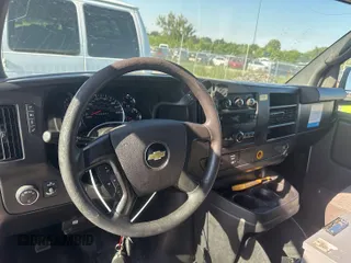 2014 Chevrolet Express Cargo with VIN 1GCWGFCA8E1121812, listed as a IAAI auction lot 42801147 with 128,506 mi miles and . Bid and sale history available at DreamBid. Image 9.