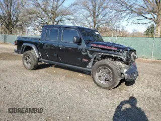 2020 Jeep Gladiator Rubicon z VIN 1C6JJTBG9LL184085, wystawiony jako Copart lot #51382115 z przebiegiem 83 375 mil mil oraz Szkoda całkowita • Salvage title. Historia ofert i sprzedaży dostępna na DreamBid. Obrazek 4.