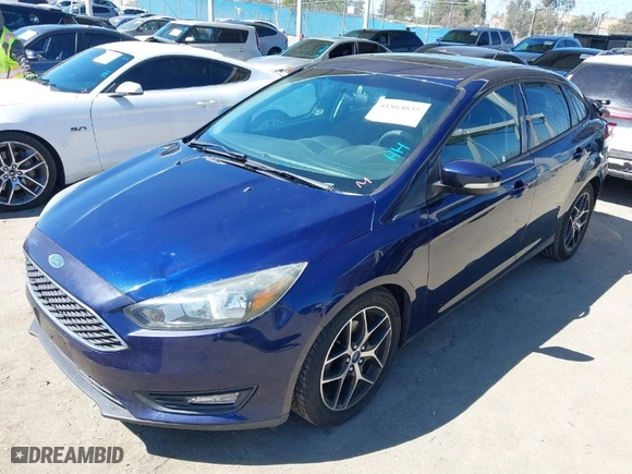 2017 Ford Focus SEL with VIN 1FADP3H21HL206514, listed as a IAAI auction lot 41864635 with 92,102 mi miles. Bid and sale history available at carsss.com. Image 2.