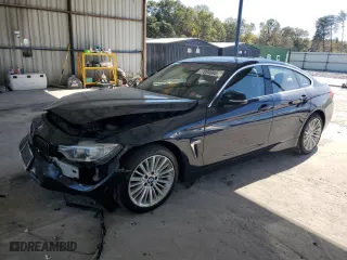 2015 BMW 4 Series 428i xDrive with VIN WBA4C9C53FD330038, listed as a Copart auction lot 77094584 with 123,906 mi miles and Salvage Title. Bid and sale history available at carsss.com. Image 1.