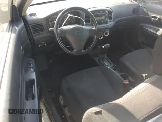 2008 Hyundai Accent SE z VIN KMHCN36C48U056976, wystawiony jako Copart lot #54720645 z przebiegiem 203 148 mil mil oraz Szkoda całkowita • Salvage title. Historia ofert i sprzedaży dostępna na DreamBid. Obrazek 8.