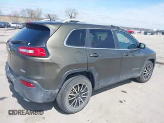 2015 Jeep Cherokee North with VIN 1C4PJMCS9FW588826, listed as a IAAI auction lot 41952883 with 145,586 mi miles. Bid and sale history available at carsss.com. Image 18.