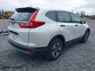 2017 Honda CR-V LX with VIN 5J6RW5H30HL000487, listed as a IAAI auction lot 42021631 with 67,368 mi miles. Bid and sale history available at carsss.com. Image 4.