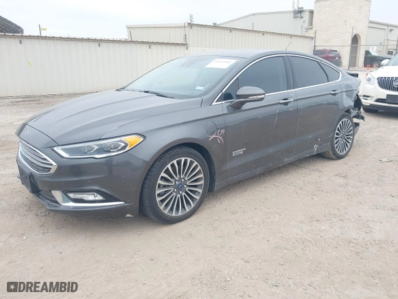 2017 Ford Fusion Energi Titanium with VIN 3FA6P0SU8HR104727, listed as a IAAI auction lot 41242482 with 83,021 mi miles. Bid and sale history available at carsss.com. Image 18.