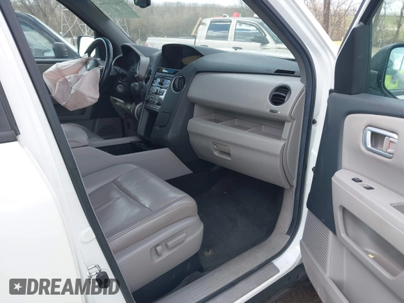 2012 Honda Pilot EX-L with VIN 5FNYF4H54CB057249, listed as a IAAI auction lot 41876322 with 180,641 mi miles and . Bid and sale history available at DreamBid. Image 5.