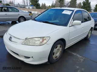 2005 Honda Civic Hybrid with VIN JHMES95635S007830, listed as a IAAI auction lot 41647785 with 384,129 mi miles. Bid and sale history available at carsss.com. Image 2.
