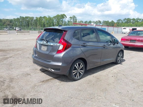 2019 Honda Fit EX z VIN 3HGGK5H89KM736677, wystawiony jako IAAI lot #42443401 z przebiegiem 58 559 mil mil oraz . Historia ofert i sprzedaży dostępna na DreamBid. Obrazek 4.
