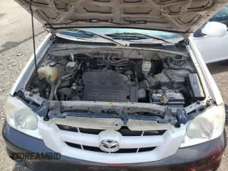 2006 Mazda Tribute S with VIN 4F2YZ04136KM18674, listed as a Copart auction lot 65126554 with 186,941 mi miles and Clean Title. Bid and sale history available at carsss.com. Image 12.