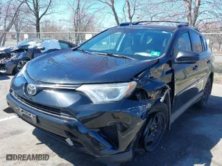 2018 Toyota RAV4 LE with VIN 2T3BFREV1JW827888, listed as a IAAI auction lot 41901303 with 181,279 mi miles. Bid and sale history available at carsss.com. Image 6.