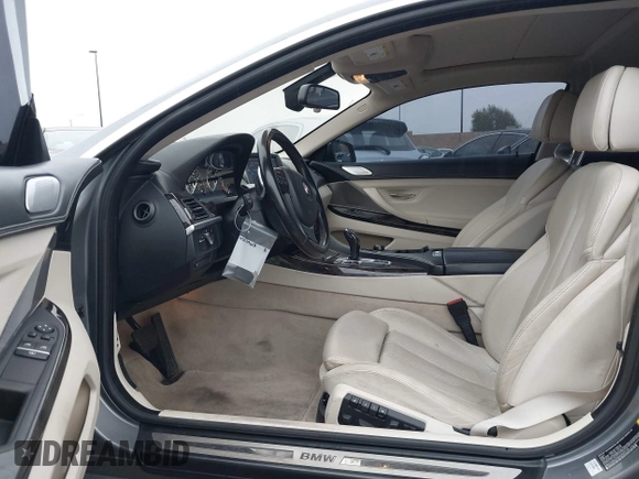 2013 BMW 6 Series 650i with VIN WBAYM9C53DDW20145, listed as a IAAI auction lot 42039618 with 66,684 mi miles and . Bid and sale history available at carsss.com. Image 5.