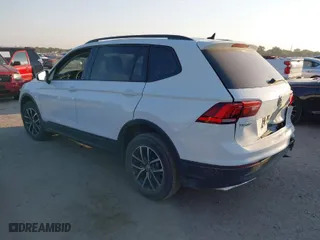 2021 Volkswagen Tiguan S with VIN 3VV1B7AX1MM002556, listed as a IAAI auction lot 40592120 with 55,222 mi miles. Bid and sale history available at carsss.com. Image 3.