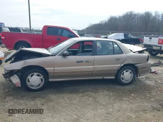 1997 Pontiac Grand Am SE with VIN 1G2NE52T1VC761092, listed as a IAAI auction lot 41547391 with 297,392 mi miles. Bid and sale history available at carsss.com. Image 15.