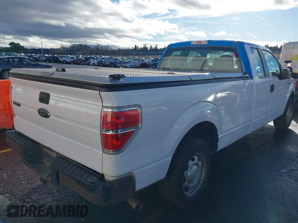 2014 Ford F-150 XL with VIN 1FTFX1CF4EKG53325, listed as a IAAI auction lot 41060015 with 216,554 mi miles. Bid and sale history available at carsss.com. Image 6.