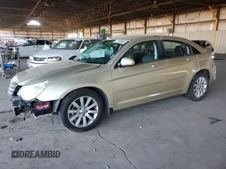2010 Chrysler Sebring Limited with VIN 1C3CC5FD2AN190727, listed as a Copart auction lot 77809954 with 122,455 mi miles and Salvage Title. Bid and sale history available at carsss.com. Image 1.