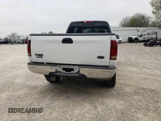 2002 Ford F-150 XL with VIN 1FTRX18L42NB60380, listed as a Copart auction lot 51806955 with 293,591 mi miles and Salvage title. Bid and sale history available at DreamBid. Image 6.