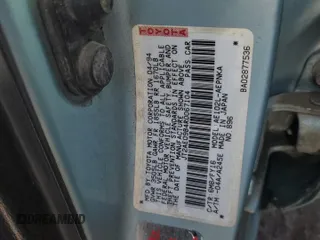 1994 Toyota Corolla Deluxe with VIN JT2AE09B4R0067104, listed as a Copart auction lot 83565064 with 207,923 mi miles and Salvage title. Bid and sale history available at DreamBid. Image 12.