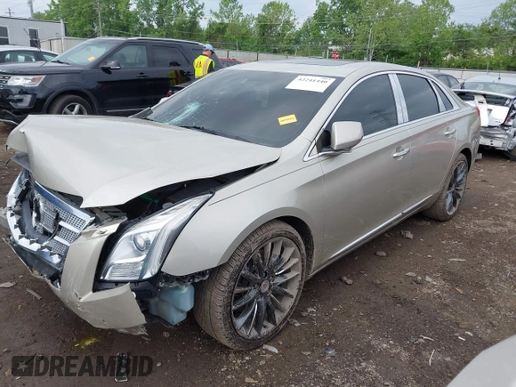 2014 Cadillac XTS Platinum z VIN 2G61T5S31E9209179, wystawiony jako IAAI lot #42241440 z przebiegiem 79 651 mil mil oraz . Historia ofert i sprzedaży dostępna na DreamBid. Obrazek 17.