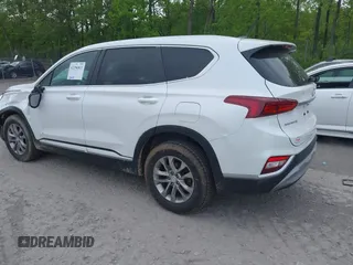 2019 Hyundai Santa Fe SE with VIN 5NMS2CAD9KH117777, listed as a IAAI auction lot 42296811 with 82,188 mi miles and . Bid and sale history available at DreamBid. Image 3.