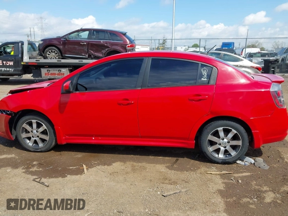 2012 Nissan Sentra S with VIN 3N1AB6AP9CL649240, listed as a IAAI auction lot 42082824 with 118,837 mi miles and . Bid and sale history available at DreamBid. Image 14.