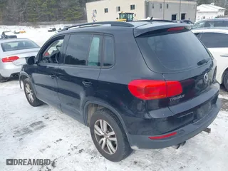 2016 Volkswagen Tiguan R-Line with VIN WVGAV7AX0GW598930, listed as a IAAI auction lot 41525554 with 142,248 mi miles. Bid and sale history available at carsss.com. Image 3.